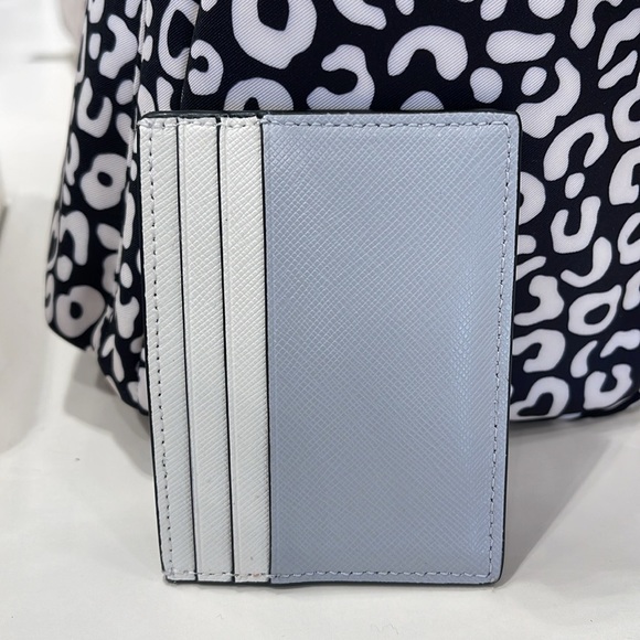 Kate Spade Madison Small Slim Card Holder
Platinum Grey Multi
NWT - Picture 6 of 16